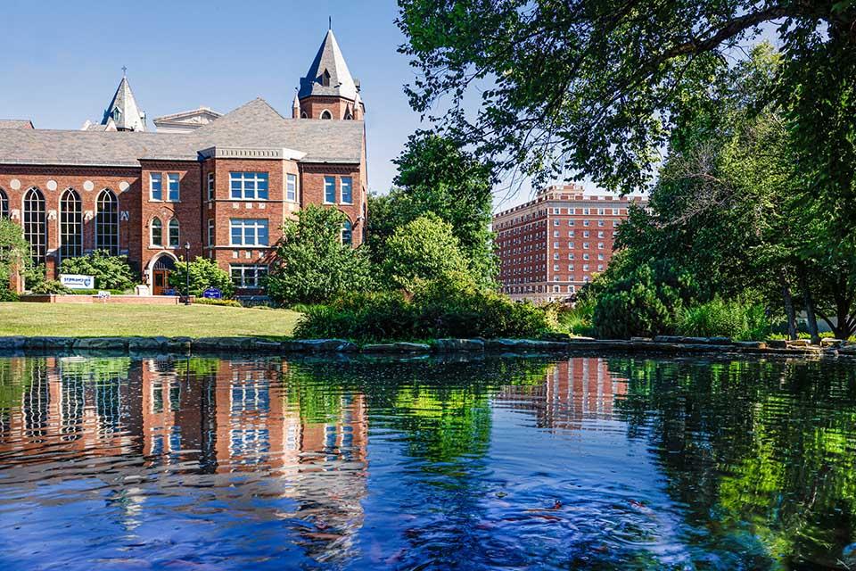 Cook school exterior with water in foreground