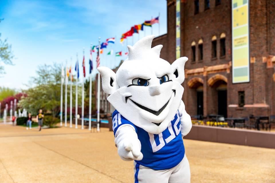 The Billiken in front of the Center for Global Citizenship.