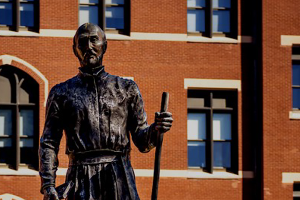 A statue of Saint Ignatius in the Quad at 博彩网址大全.